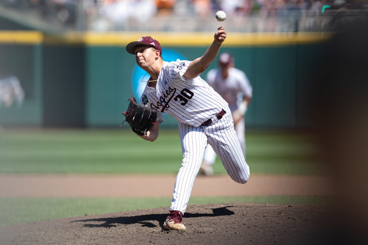 Texas A&M pitcher Kaiden Wilson (30) delivers a pitch during Texas A&M’s game against Tennessee at the NCAA Men’s College World Series finals at Charles Schwab Field in Omaha, Nebraska on Saturday, June 22, 2024. (Chris Swann/The Battalion)
