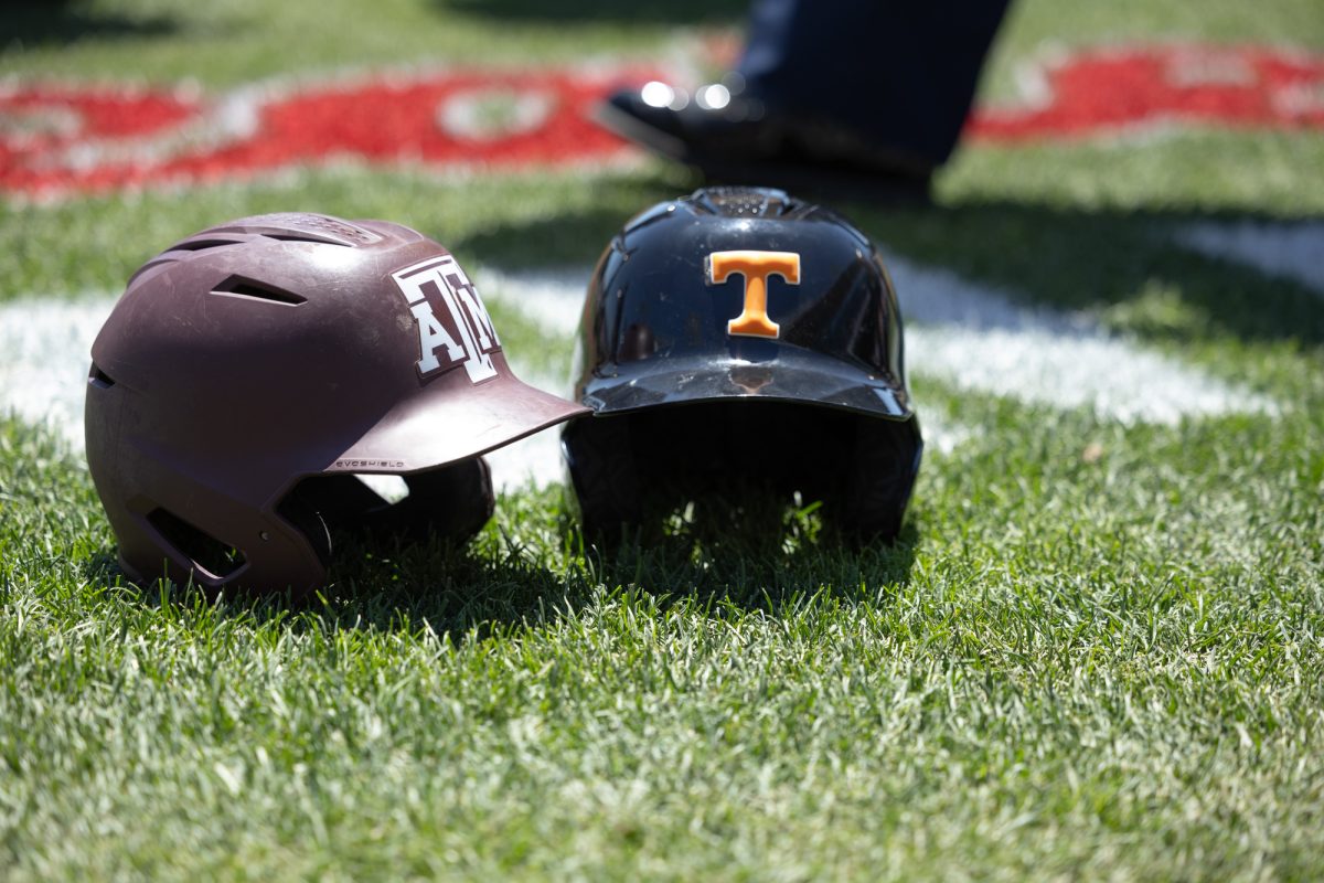 Texas A&M and Tennessee helmets are laid behind home plate before Texas A&M’s game against Tennessee at the NCAA Men’s College World Series finals at Charles Schwab Field in Omaha, Nebraska on Saturday, June 22, 2024. (Chris Swann/The Battalion)