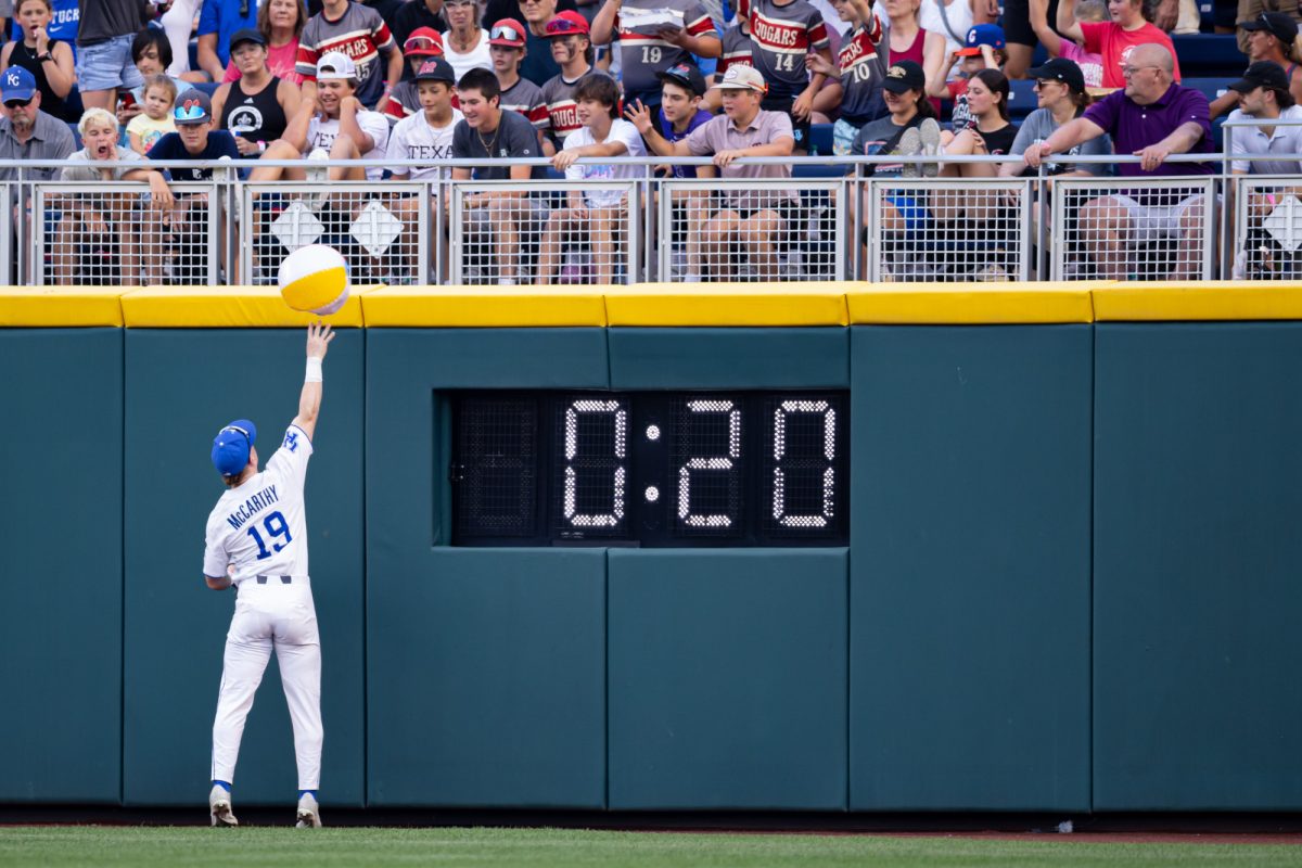 Kentucky outfielder Nolan McCarthy (19) throws a tossed beach ball back into the stands during Texas A&M’s game against Kentucky at the NCAA Men’s College World Series at in Omaha, Nebraska on Monday, June 17, 2024. (Chris Swann/The Battalion)