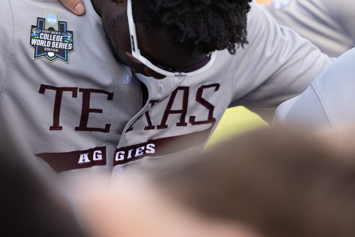 Texas A&M pitcher Eldridge Armstrong III (15) before Texas A&M’s game against Tennessee at the NCAA Men’s College World Series finals at Charles Schwab Field in Omaha, Nebraska on Monday, June 24, 2024. (Chris Swann/The Battalion)