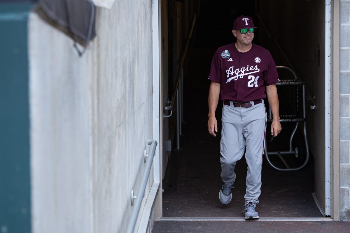 Texas A&M Director of Baseball Operations Jason Hutchins (24) walks out the tunnel before Texas A&M’s game against Florida at the NCAA Men’s College World Series semifinals at Charles Schwab Field in Omaha, Nebraska on Wednesday, June 19, 2024. (Chris Swann/The Battalion)