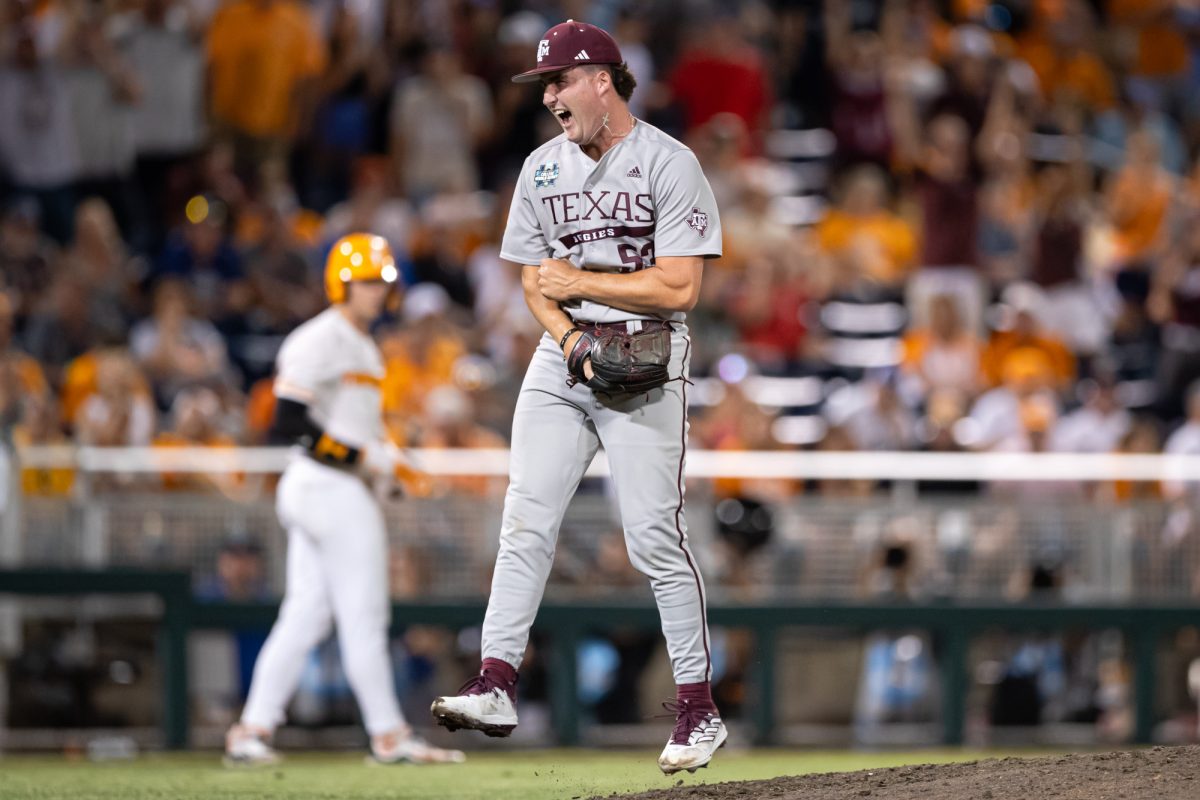 Texas A&M pitcher Evan Aschenbeck (53) reacts after the final strikeout after Texas A&M’s win against Tennessee at the NCAA Men’s College World Series finals at Charles Schwab Field in Omaha, Nebraska on Saturday, June 22, 2024. (Chris Swann/The Battalion)