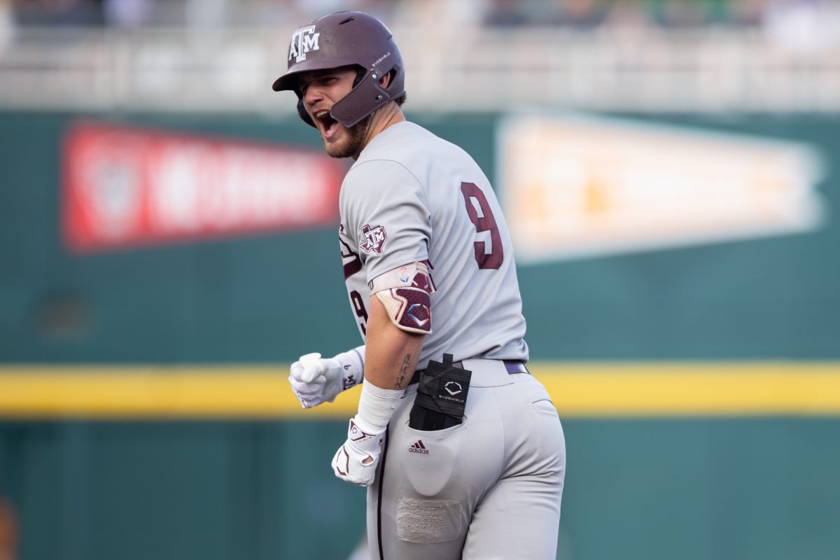 Texas A&M utility Gavin Grahovac (9) reacts after hitting a home-run during Texas A&M’s game against Tennessee at the NCAA Men’s College World Series finals at Charles Schwab Field in Omaha, Nebraska on Saturday, June 22, 2024. (Chris Swann/The Battalion)