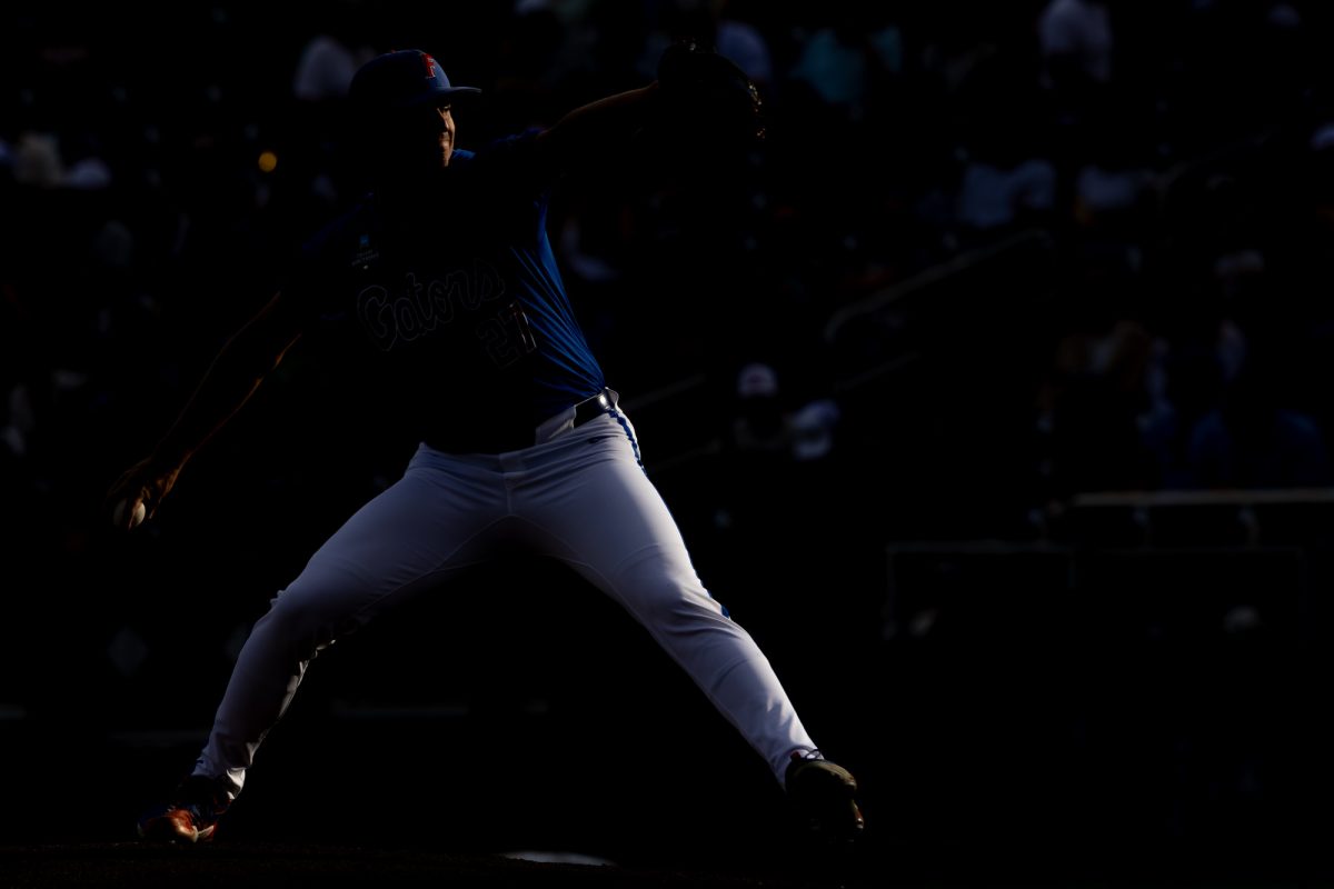 Florida pitcher Fisher Jameson (27) delivers a pitch during Texas A&M’s game against Florida at the NCAA Men’s College World Series semifinals at Charles Schwab Field in Omaha, Nebraska on Wednesday, June 19, 2024. (Chris Swann/The Battalion)