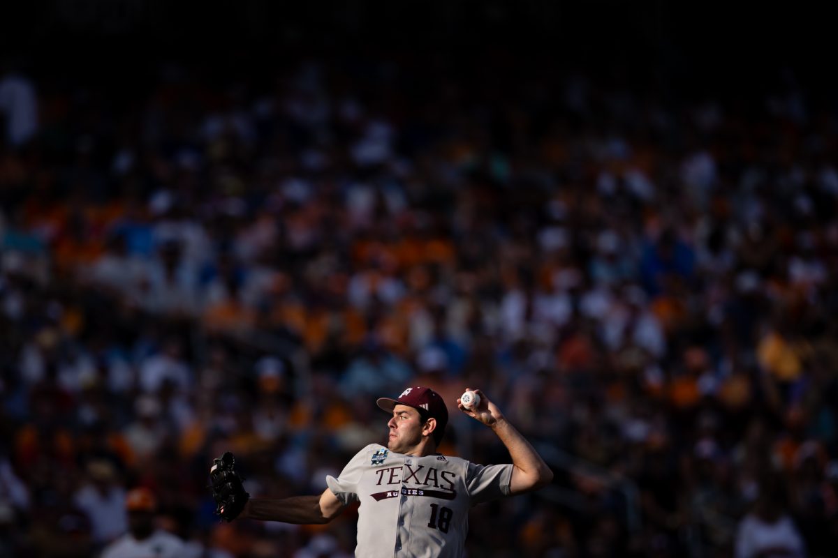 Texas A&M pitcher Ryan Prager (18) delivers a pitch during Texas A&M’s game against Tennessee at the NCAA Men’s College World Series finals at Charles Schwab Field in Omaha, Nebraska on Saturday, June 22, 2024. (Chris Swann/The Battalion)