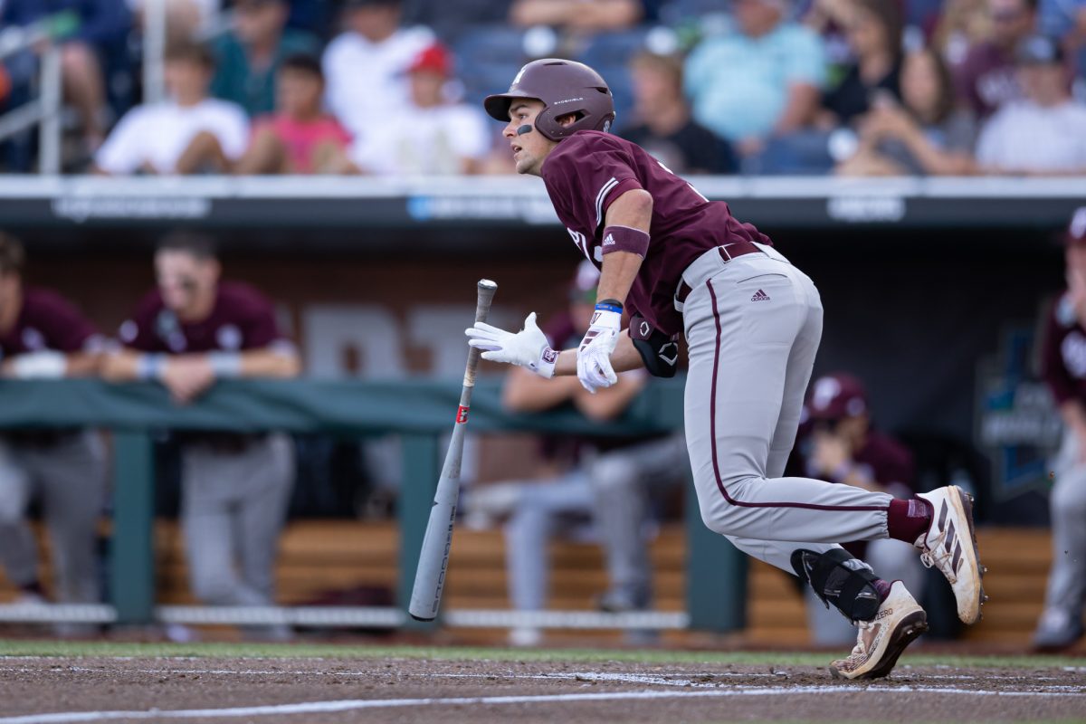 Texas A&M infielder Kaeden Kent (3) drops hit bat after a hit during Texas A&M’s game against Florida at the NCAA Men’s College World Series semifinals at Charles Schwab Field in Omaha, Nebraska on Wednesday, June 19, 2024. (Chris Swann/The Battalion)