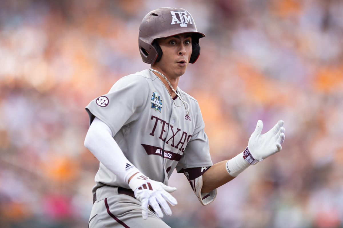 Texas A&M infielder Ali Camarillo (2) rounds first base during Texas A&M’s game after a Tennessee error against Tennessee at the NCAA Men’s College World Series finals at Charles Schwab Field in Omaha, Nebraska on Saturday, June 22, 2024. (Chris Swann/The Battalion)