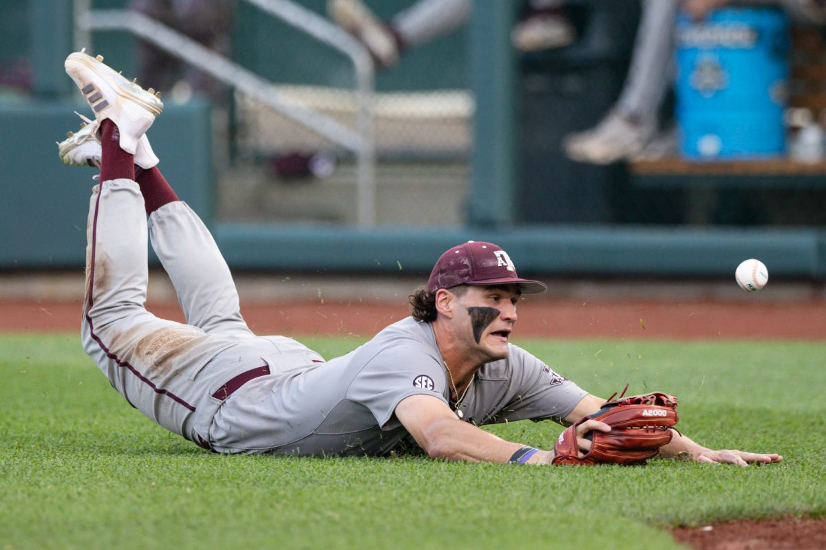 Texas A&M outfielder Jace Laviolette (17) commits an error trying to catch the ball during Texas A&M’s game against Tennessee at the NCAA Men’s College World Series finals at Charles Schwab Field in Omaha, Nebraska on Monday, June 24, 2024. (Chris Swann/The Battalion)