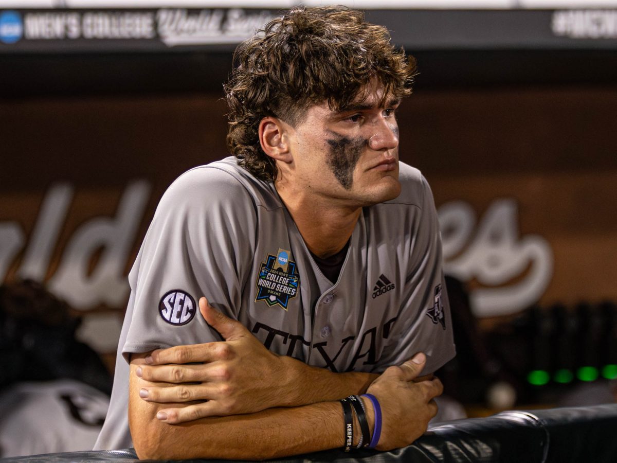 Texas A&M outfielder Jace Laviolette (17) reacts in the dugout after Texas A&M’s game against Tennessee at the NCAA Men’s College World Series finals at Charles Schwab Field in Omaha, Nebraska on Monday, June 24, 2024. (Hannah Harrison/The Battalion)