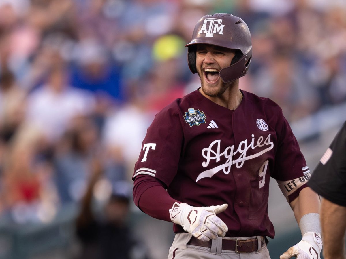 Texas A&amp;M utility Gavin Grahovac (9) celebrates a double during Texas A&amp;M’s game against Florida at the NCAA Men’s College World Series semifinal at Charles Schwab Field in Omaha, Nebraska on Sunday, June 19, 2024. (Hannah Harrison/The Battalion)