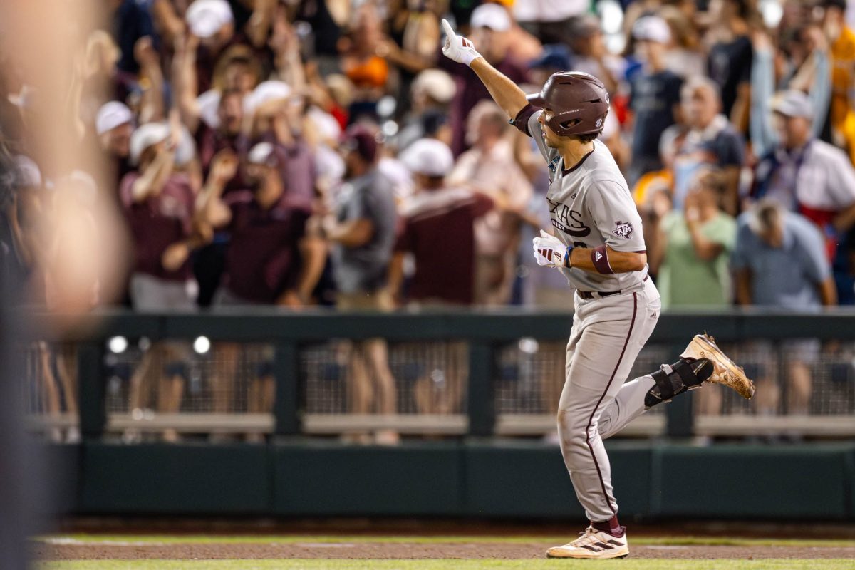 Texas A&M infielder Kaeden Kent (3) celebrates a home run during Texas A&M’s game against Tennessee at the NCAA Men’s College World Series finals at Charles Schwab Field in Omaha, Nebraska on Saturday, June 22, 2024. (Hannah Harrison/The Battalion)