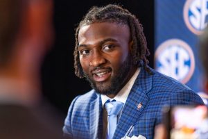 Texas A&M DL Shemar Turner (5) speaks during the 2024 SEC Media Day at the Omni Hotel in Dallas, Texas on Thursday July 18, 2024. (Hannah Harrison/The Battalion)