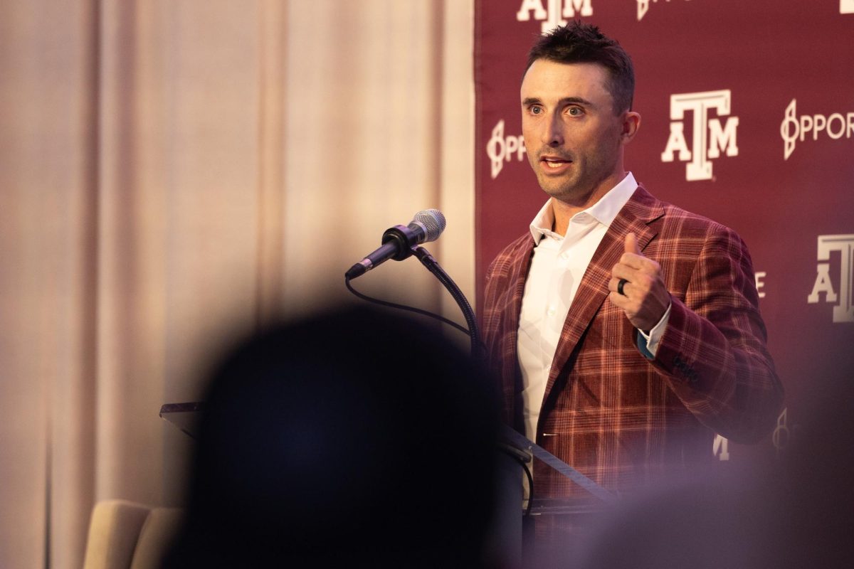Texas A&M Head Coach Michael Earley speaks to fans during a welcome ceremony in the Kyle Field Hall of Champions on Tuesday, July 2, 2024. Earley was hired on Sunday, June 30, after originally joining former head coach Jim Schlossnagles staff at Texas.