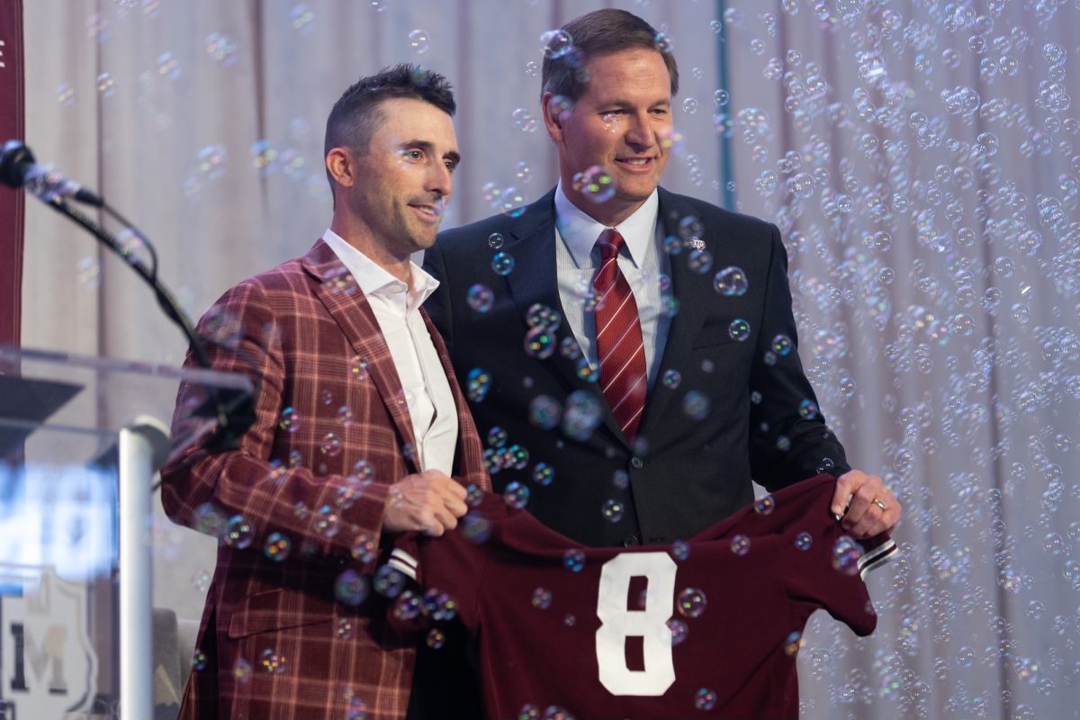 Texas A&amp;M head coach Michael Earley speaks to fans during a welcome ceremony in the Kyle Field Hall of Champions on Tuesday, July 2, 2024. Earley was hired on Sunday, June 30, after originally joining former head coach Jim Schlossnagle's staff at Texas.