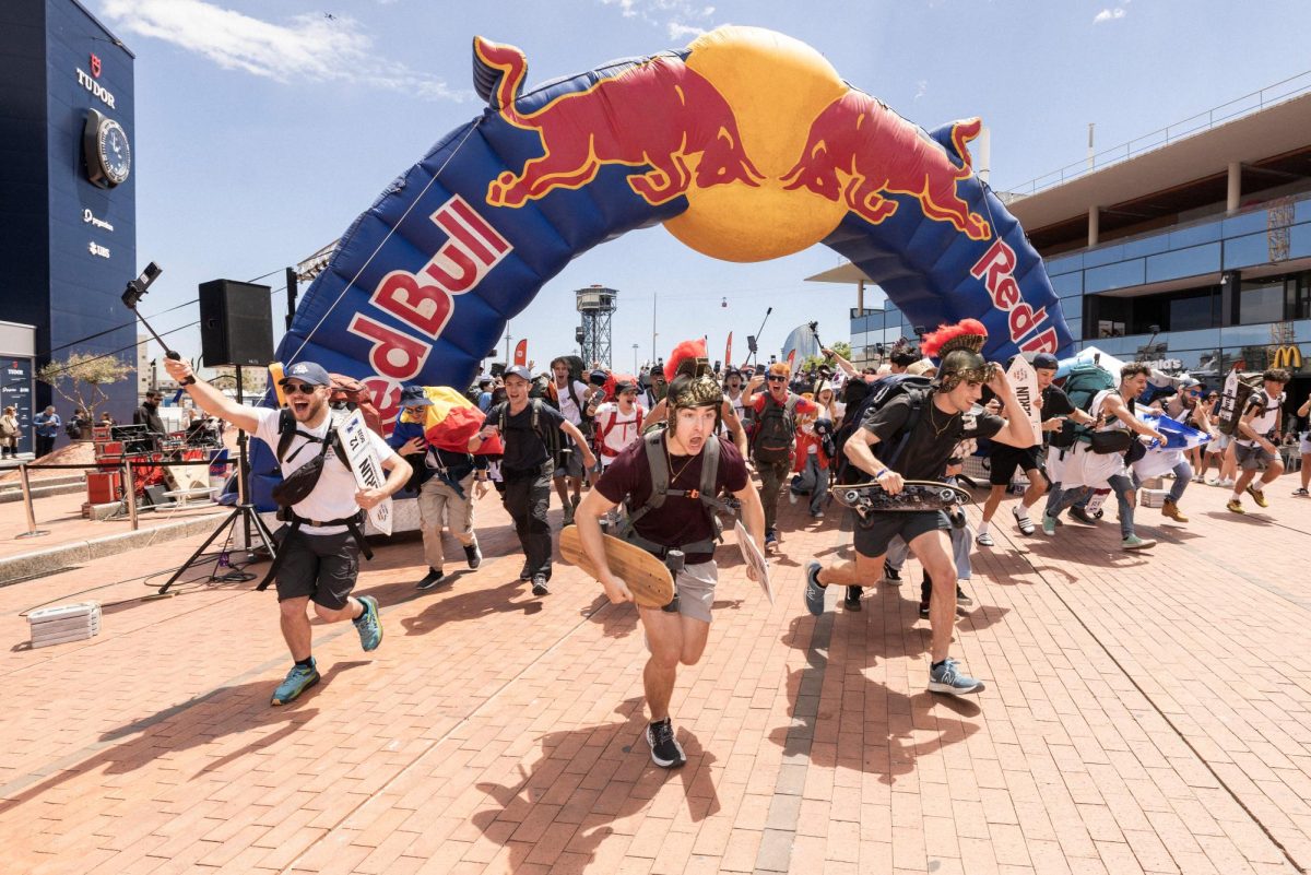 The Gladiators and other participants run off at the starting line to compete in the Red Bull Can You Make It? Challenge.
