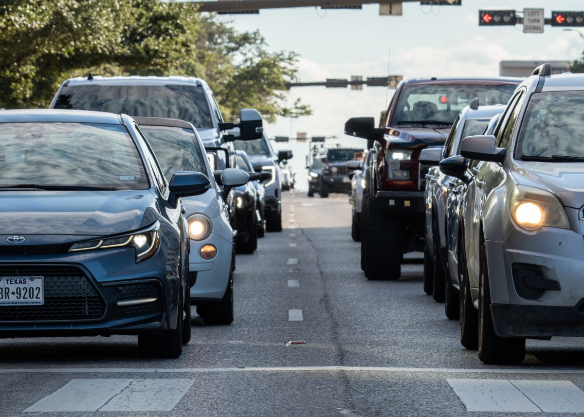 Cars drive on University Dr. on Thursday, Aug. 29, 2024. (Sarthak Dalal/The Battalion)