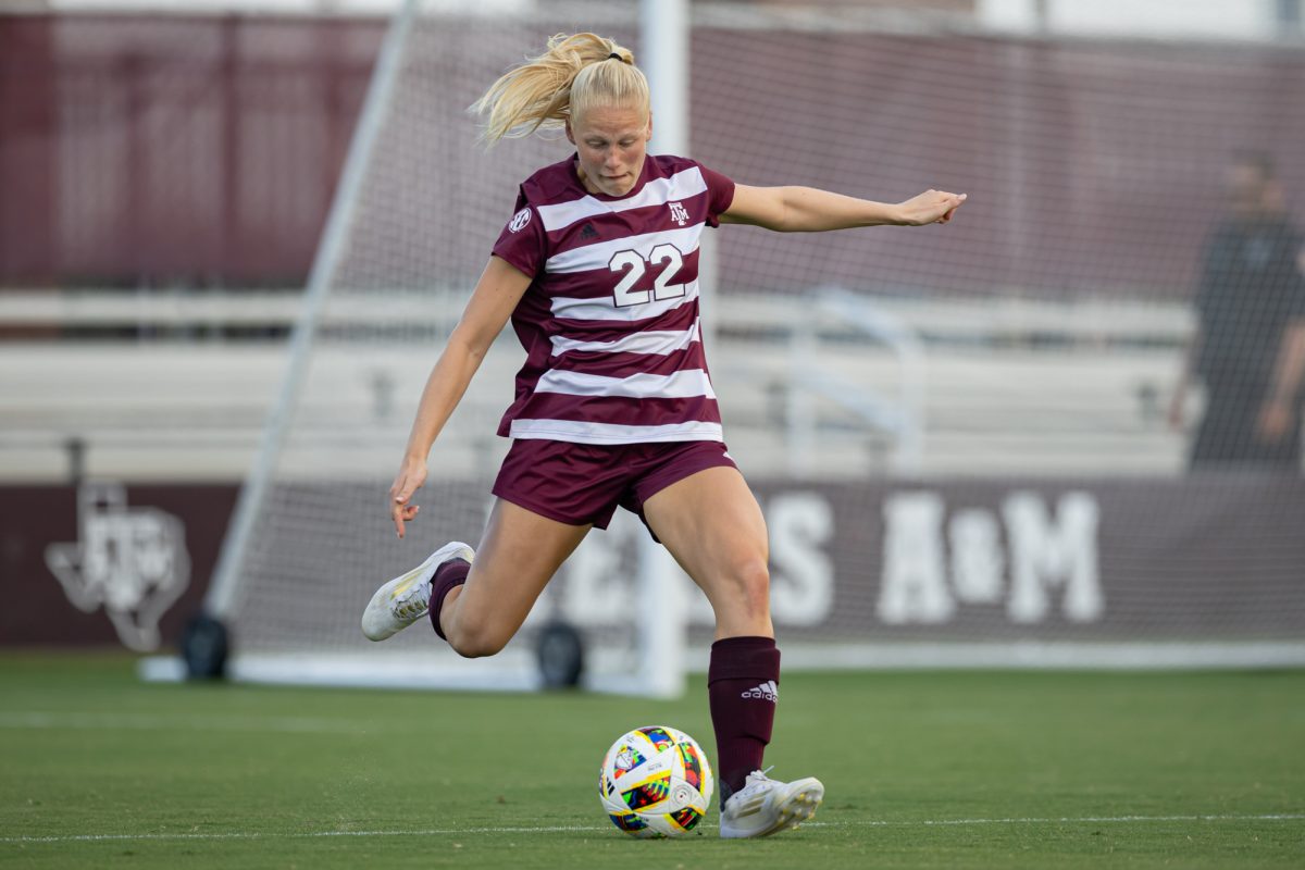 Texas A&M defender Margo Matule (22) kicks the ball during the first half of Texas A&M’s exhibition match against Rice at Ellis Field on Saturday, August 3, 2024. (Chris Swann/The Battalion)