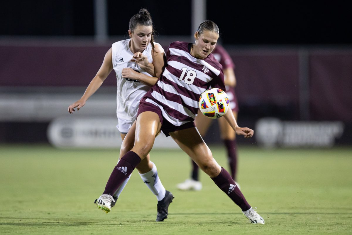 Texas A&amp;M defender Macy Matula (18) contests for the ball with a Rice defender during Texas A&amp;M’s exhibition match against Rice at Ellis Field on Saturday, August 3, 2024. (Chris Swann/The Battalion)