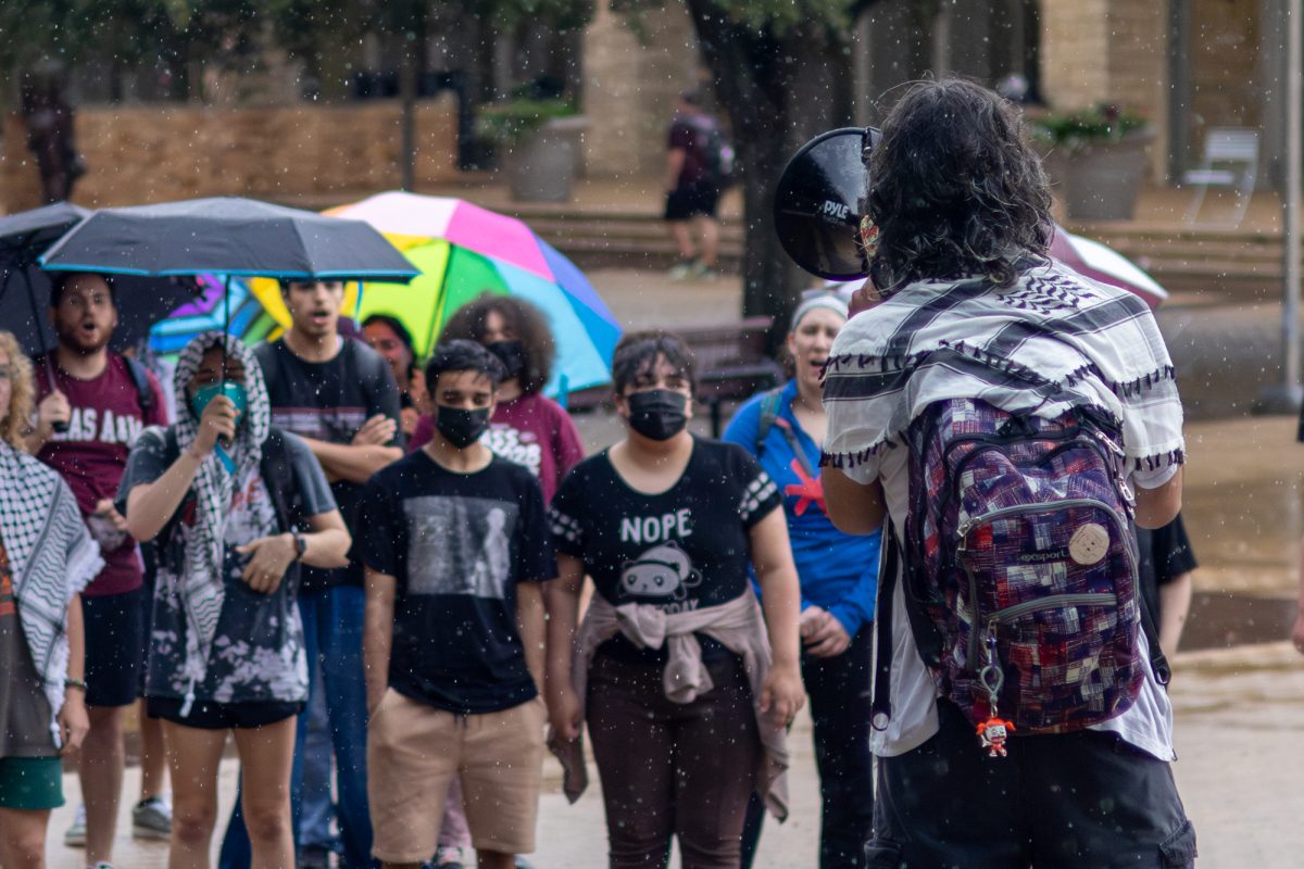 Sociology junior Akkad Ajam leads a pro-Palestinian demonstration at Rudder Plaza on Monday August 26, 2024. (Abdurahman Azeez/The Battalion)