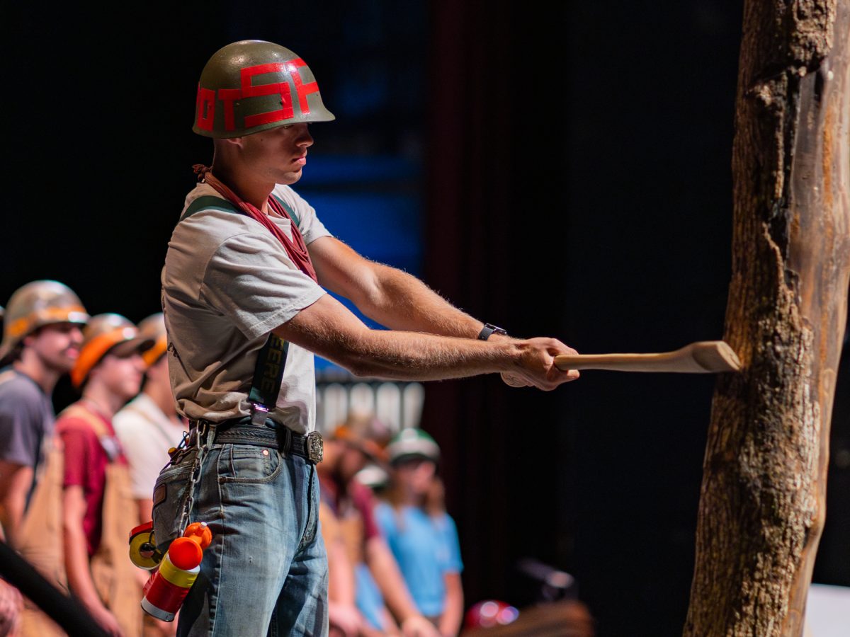 A Brown Pot demonstrates a cut during a presentation at Cut Class in Rudder Auditorium on Wednesday, August 28, 2024. (Hannah Harrison/The Battalion)