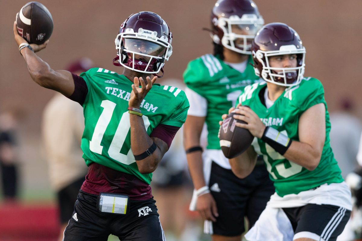 Texas A&amp;M quarterbacks Marcel Reed (10) and Connor Weigman (15) throw the ball during the second day of fall football practice outside the Coolidge Football Performance Center on August 1, 2024. (Chris Swann/The Battalion)