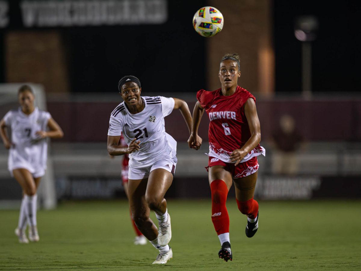 Texas A&amp;M forward Jazmine Wilkinson (21) runs for a ball against Denver defender Jordan Crockett (6) during Texas A&amp;M’s game against Denver at Ellis Field on Wednesday, August 21, 2024. (Hannah Harrison/The Battalion)