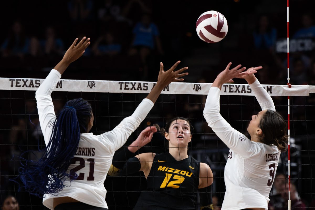 Texas A&amp;M opposite Logan Lednicky (9) sets the ball during Texas A&amp;M’s game against Mizzou at Reed Arena on Sunday, Sept. 29, 2024. (Chris Swann/The Battalion)