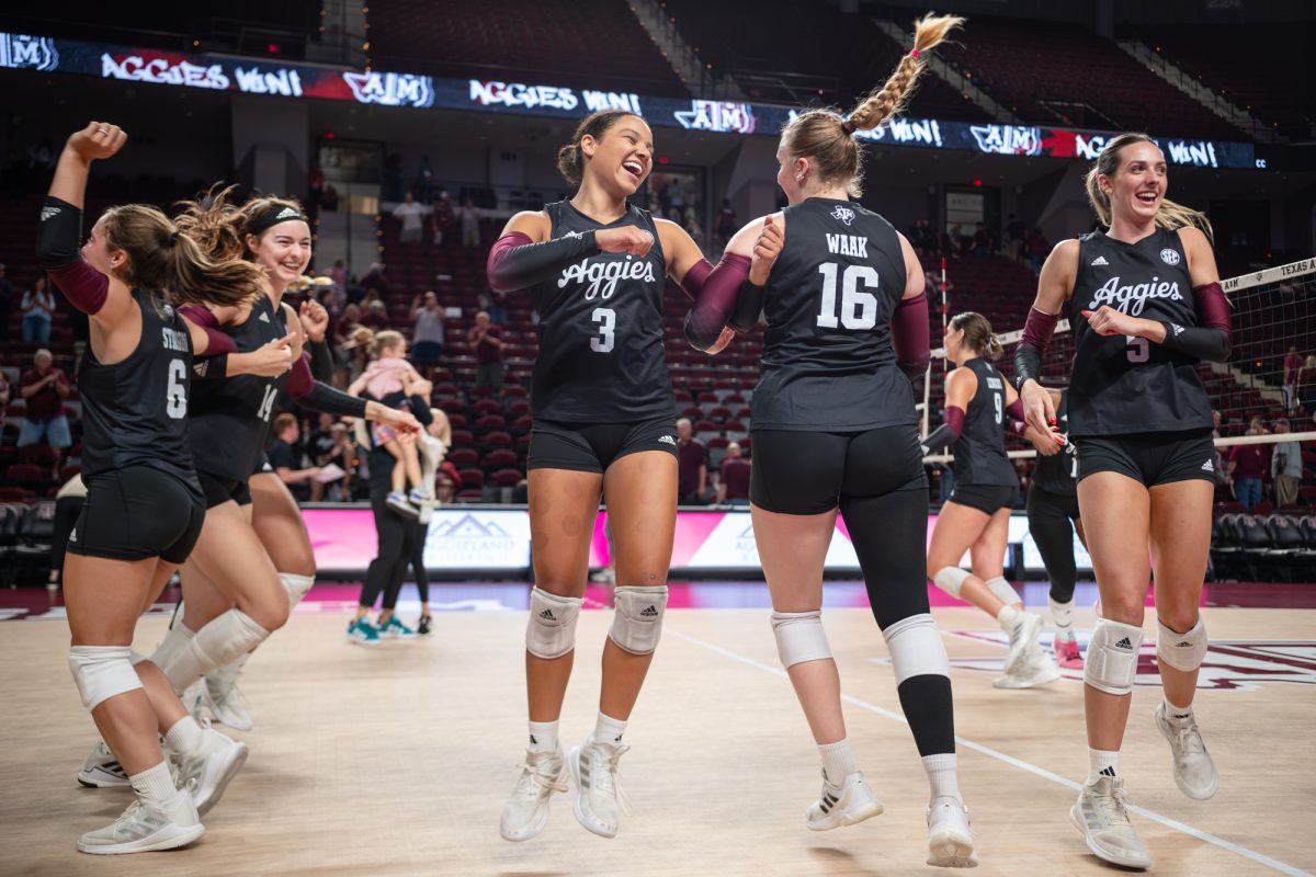 Texas A&amp;M libero/defensive specialist Tatum Thomas (3) celebrates a win with Texas A&amp;M setter Maddie Waak (16) after Texas A&amp;M’s game against Temple at Reed Arena on Friday, September 13, 2024. (Hannah Harrison/The Battalion)