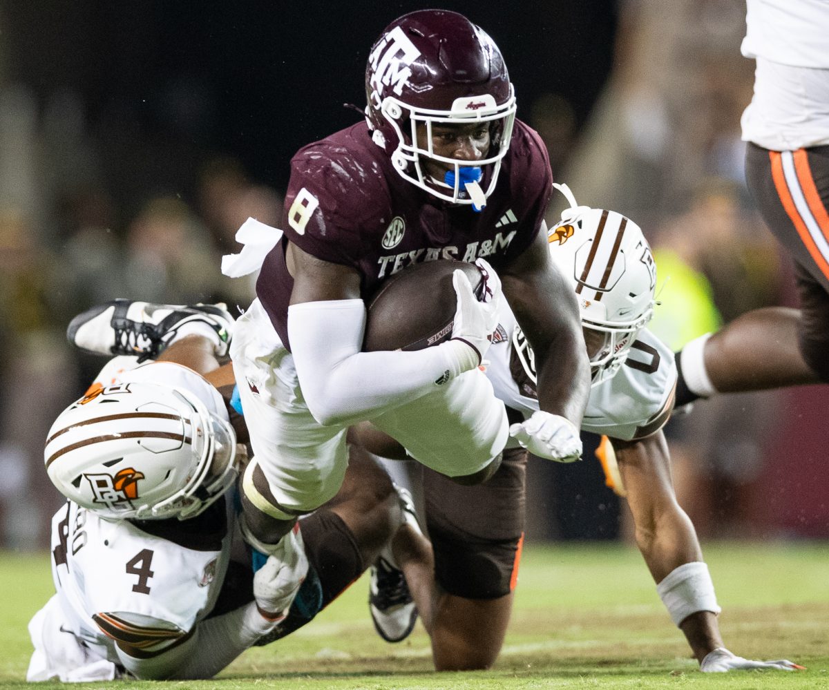 Texas A&amp;M Aggies running back Le'Veon Moss (8) mid-tackle during the Texas A&amp;M and the Bowling Green football game at Kyle Field on Saturday, Sept 21, 2024. (Adriano Espinosa/ The Battalion)