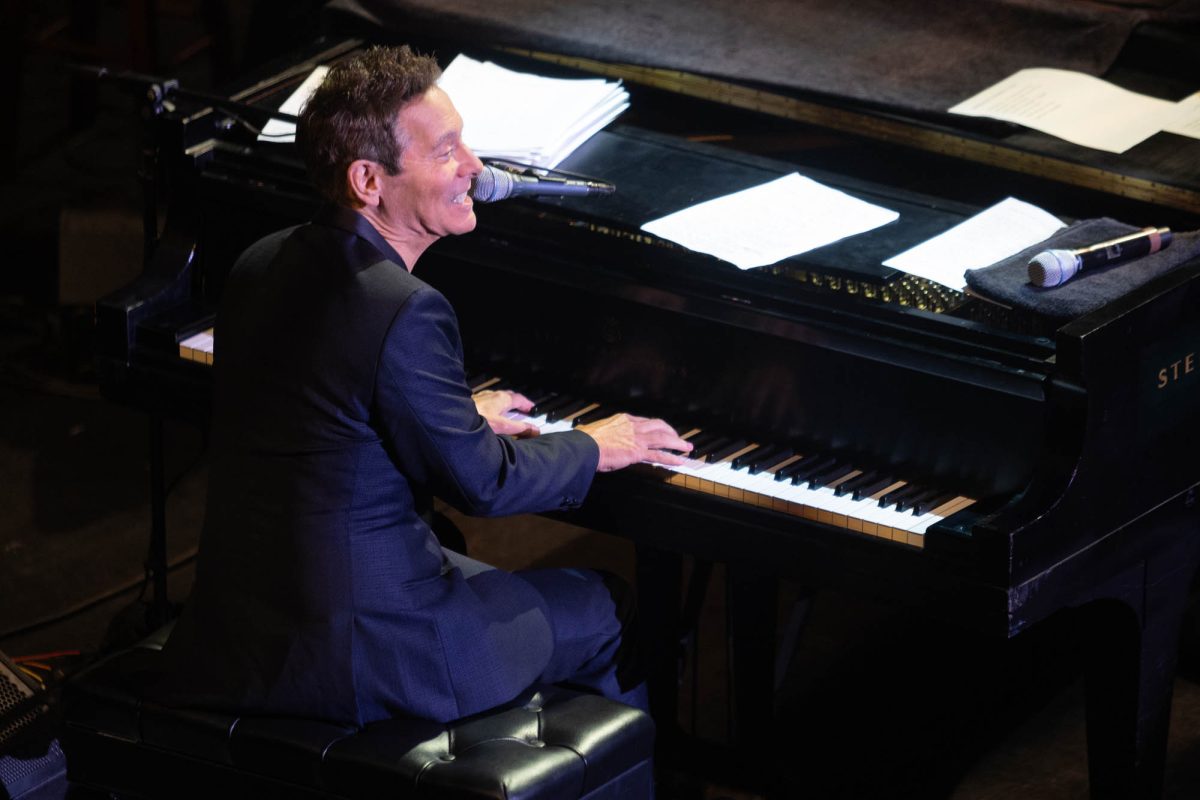 Renowned musician Michael Feinstein performs at the Tony Bennett Tribute Concert hosted by OPAS at the Rudder Auditorium on Tuesday, Sept. 24, 2024. (Trinity Hindman/The Battalion)