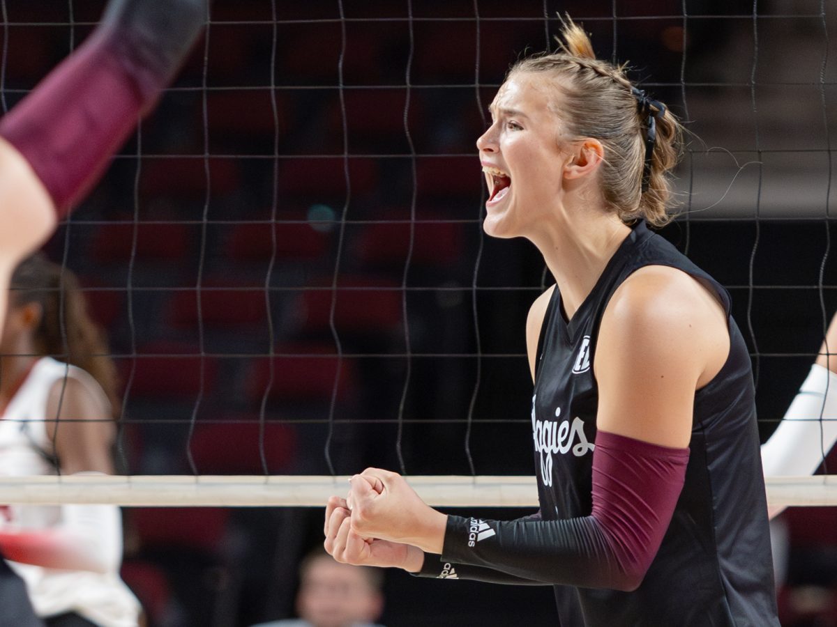 Texas A&amp;M outside hitter Emily Hellmuth (4) celebrates a point during Texas A&amp;M’s game against Temple at Reed Arena on Friday, September 13, 2024. (Hannah Harrison/The Battalion)