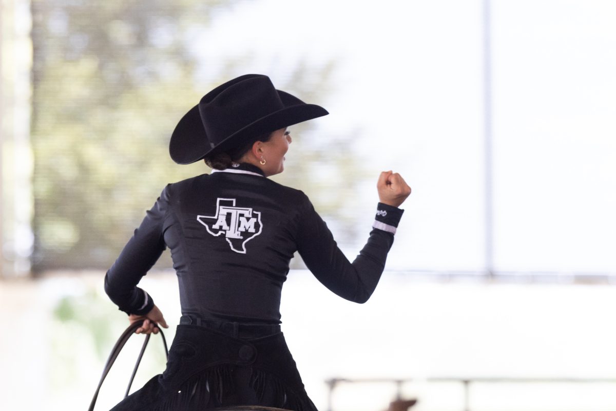 Mckinney Atkinson cheeres after completing her horsemanship ride during Texas A&amp;M’s maroon and white scrimmage at the Hildebrand Equine Complex on Sunday, Sept. 15, 2024.