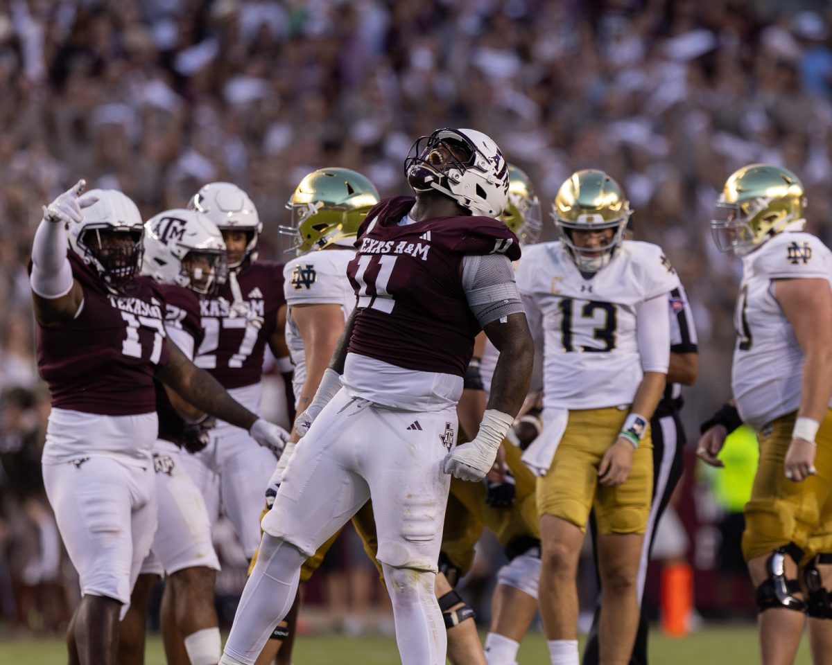 Texas A&amp;M defensive lineman Nic Scourton (11) celebrates after a tackle during Texas A&amp;M’s game against Notre Dame at Kyle Field on Saturday, Aug. 31, 2024. (Kyle Heise/The Battalion)