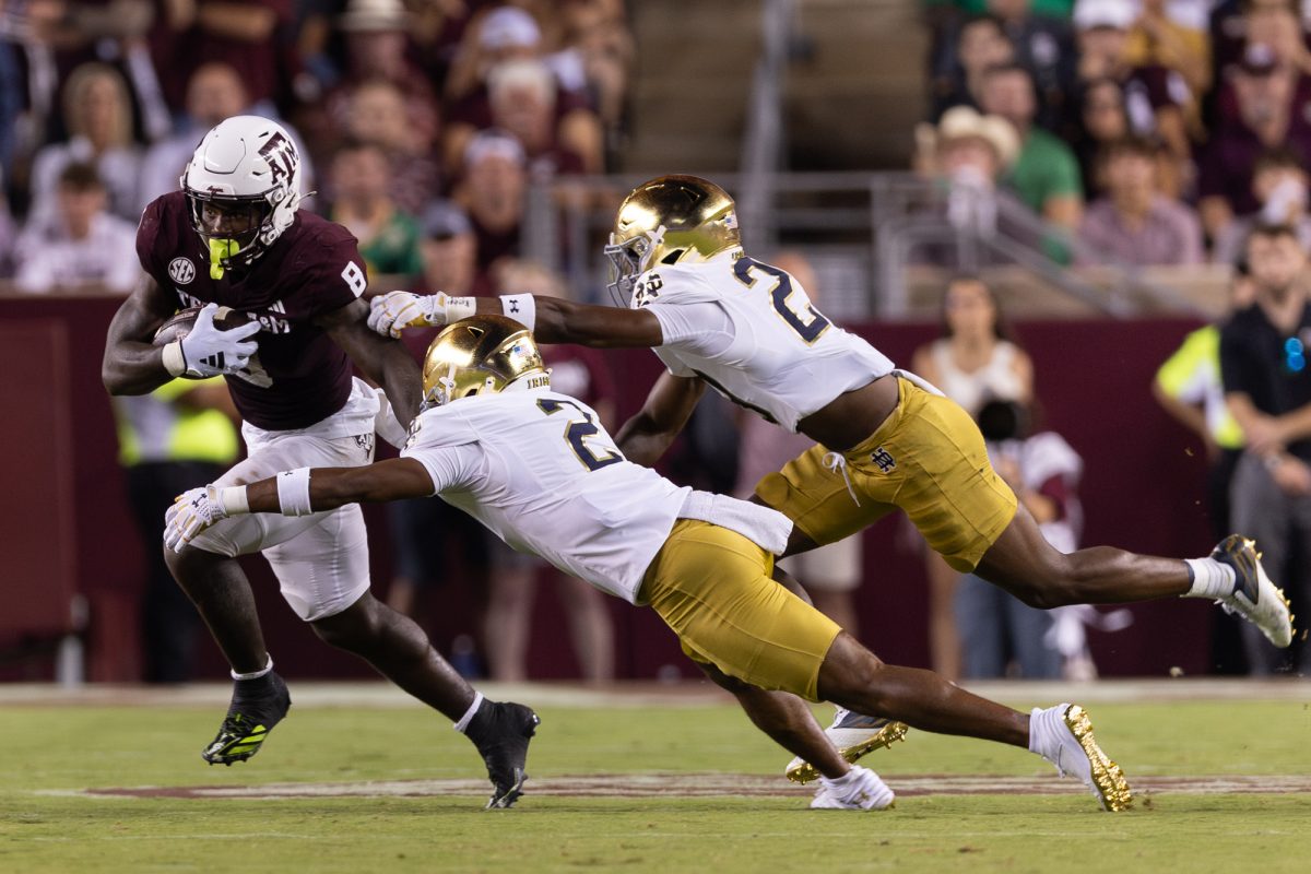 Texas A&M running back Le'Veon Moss (8) runs during Texas A&M’s game against Notre Dame at Kyle Field on Saturday, Aug. 31, 2024. (Kyle Heise/The Battalion)