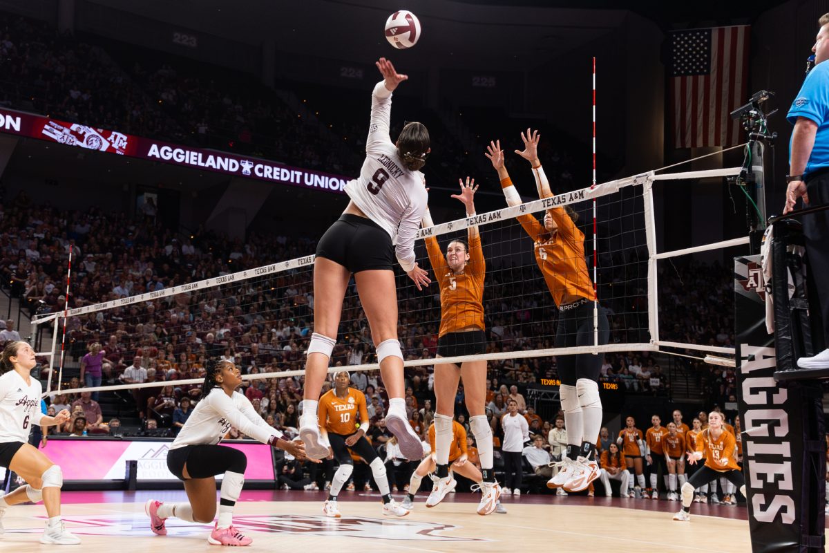 Texas A&amp;M opposite hitter Logan Lednicky (9) swings at a ball during Texas A&amp;M’s game against Texas at Reed Arena on Friday, Sept. 27, 2024. (Hannah Harrison/The Battalion)