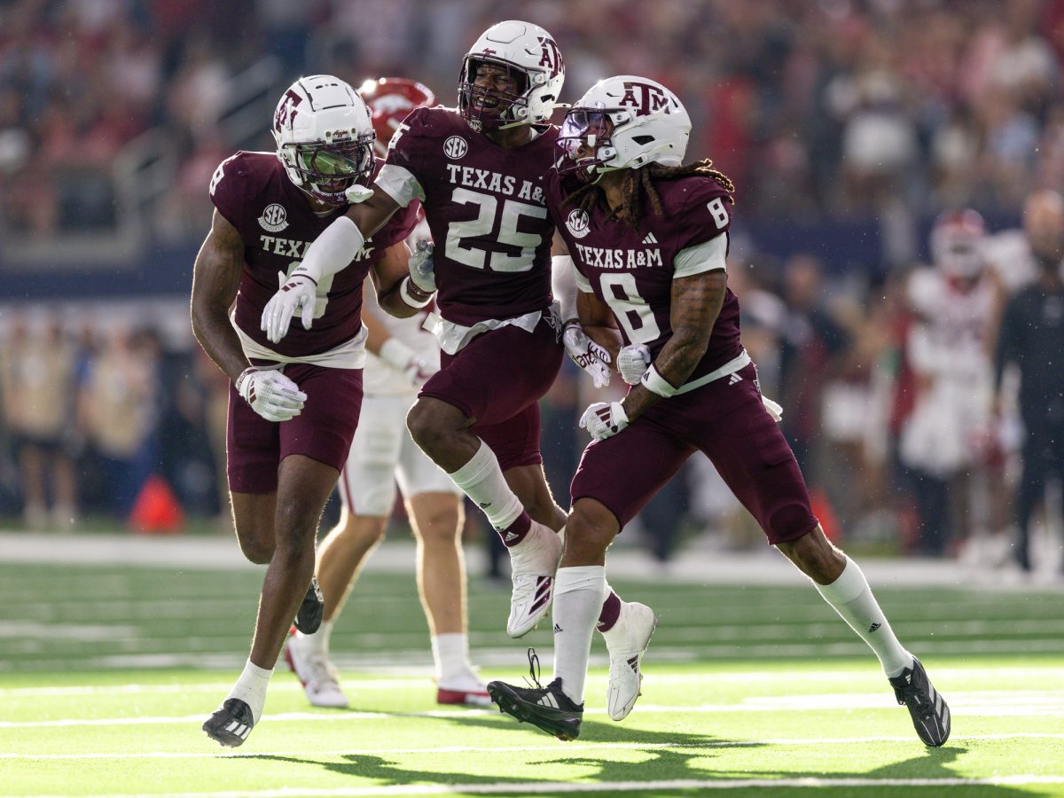 The Aggie defense reacts after a defensive stop during Texas A&M’s game against Arkansas at the Southwest Classic at AT&T Stadium in Arlington, Texas on Saturday, Sept. 28, 2024. (Chris Swann/The Battalion)