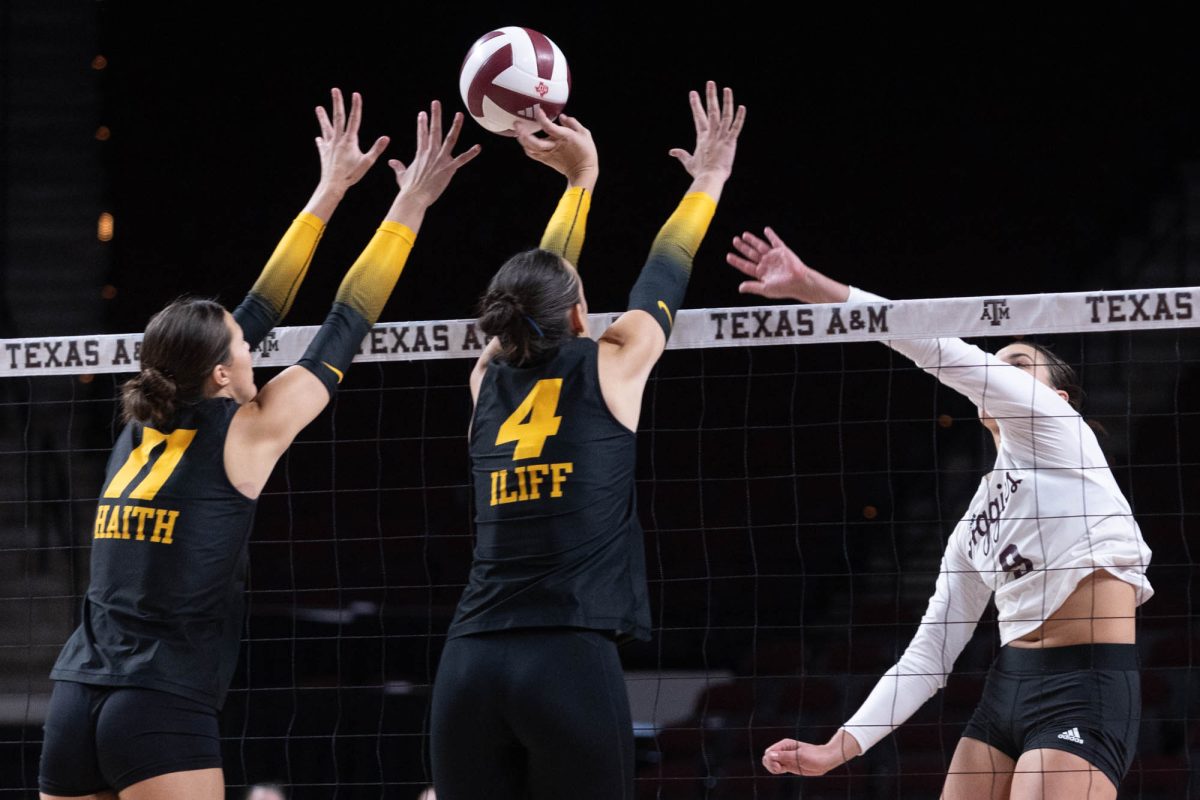 Texas A&M opposite Logan Lednicky (9) hits the ball during Texas A&M’s game against Mizzou at Reed Arena on Sunday, Sept. 29, 2024. (Trinity Hindman/The Battalion)