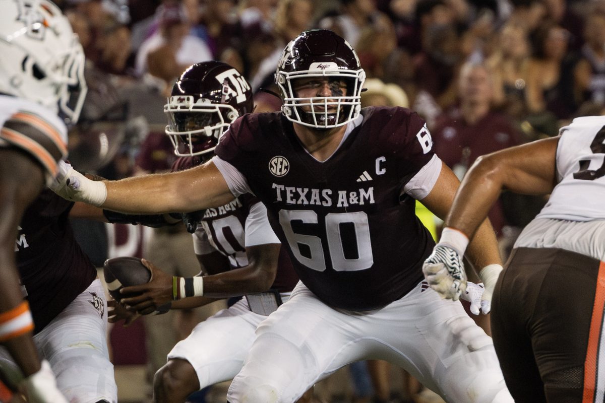 Texas A&amp;M offensive lineman Trey Zuhn (60) finds a player to block after the ball is snapped during Texas A&amp;M's game against Bowling Green on Saturday, September 21, 2024. (Kelii Horvath/The Battalion)