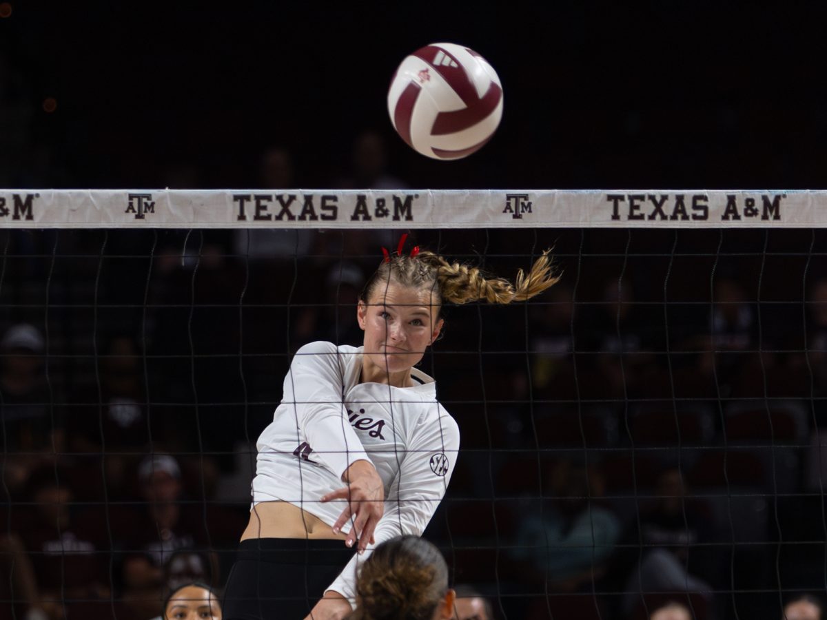 Texas A&amp;M outside hitter Emily Hellmuth (4) makes contact with a ball during Texas A&amp;M’s game against Texas A&amp;M Corpus Christi at Reed Arena on Monday, September 2, 2024. (Hannah Harrison/The Battalion)