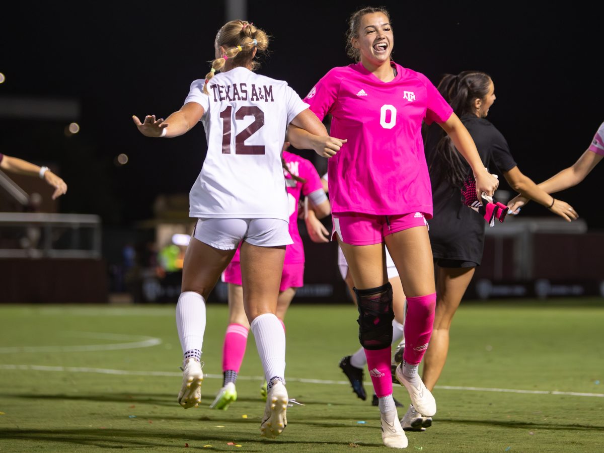 Texas A&amp;M middle Reese Rupe (12) pand goal keeper Sydney Fuller (0) sing the Aggie War Hymn during Texas A&amp;M's against Auburn at Ellis Field on Thursday, Sept. 26,2024. (Valentina Lopez/ The Battalion)