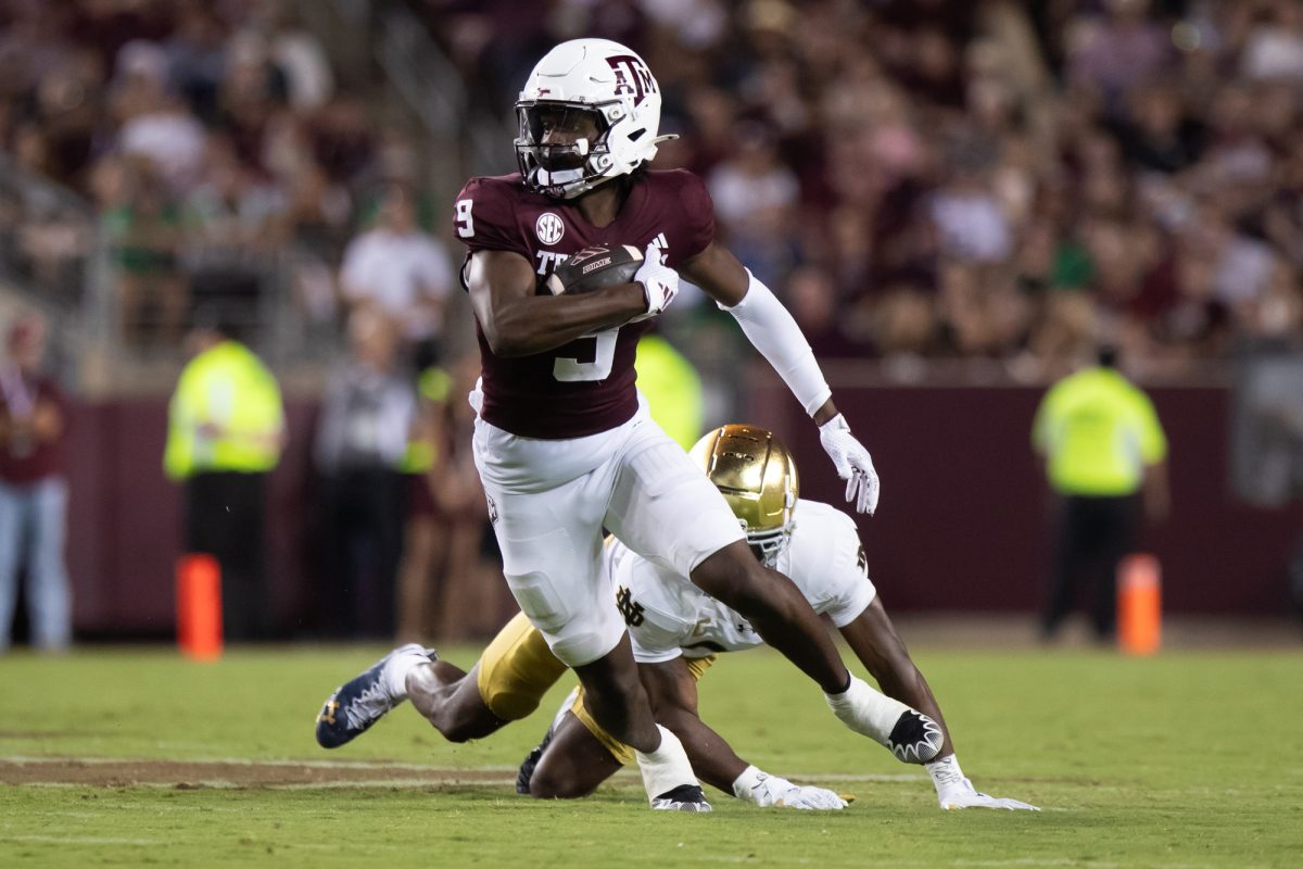 Texas A&amp;M Aggies wide receiver Jahdae Walker (9) runs with the ball during Texas A&amp;M’s game against Notre Dame at Kyle Field on Saturday, Aug. 31, 2024. (Chris Swann/The Battalion)