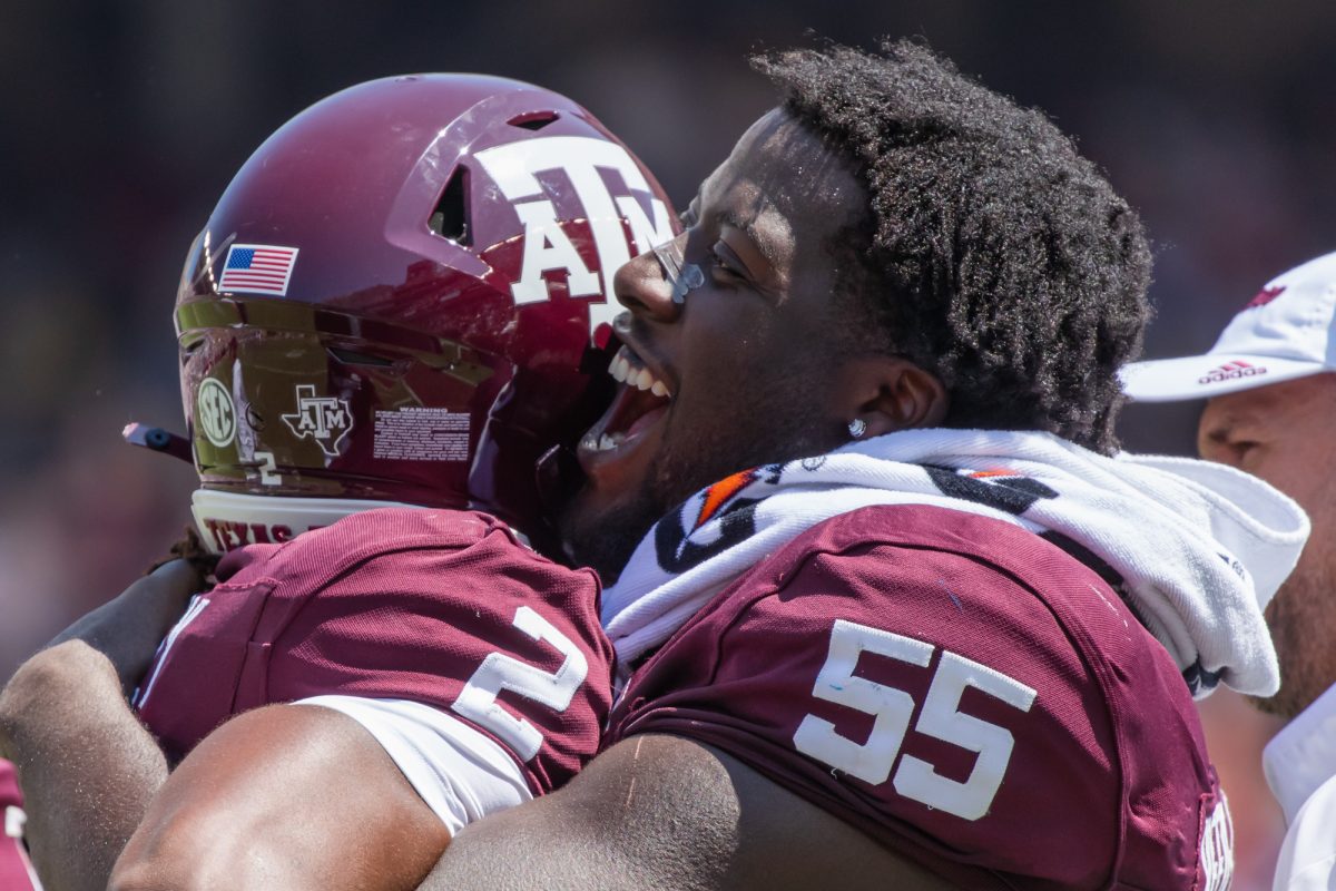 Texas A&M Aggies offensive lineman Ar'maj Reed-Adams (55) reacts after running back Terry Bussey’s (2) 65-yard touchdown run during Texas A&M’s game against McNeese State at Kyle Field on Saturday, Sept. 7, 2024. (Chris Swann/The Battalion)