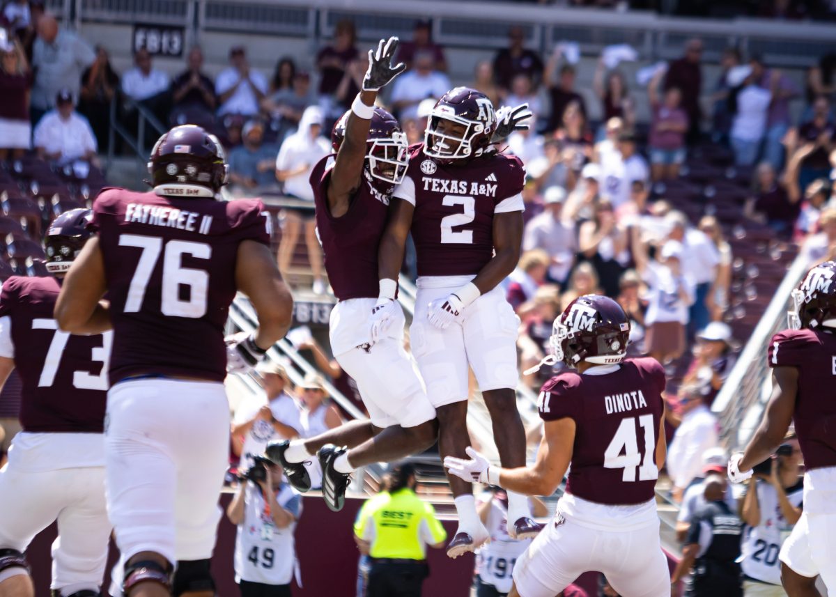 Texas A&amp;M Aggies wide receiver Micah Tease (4) and Texas A&amp;M Aggies athlete Terry Bussey (2) react after a touchdown during Texas A&amp;M's game against McNeese State at Kyle Field on Saturday, Sept. 7, 2024. (Adriano Espinosa/The Battalion)