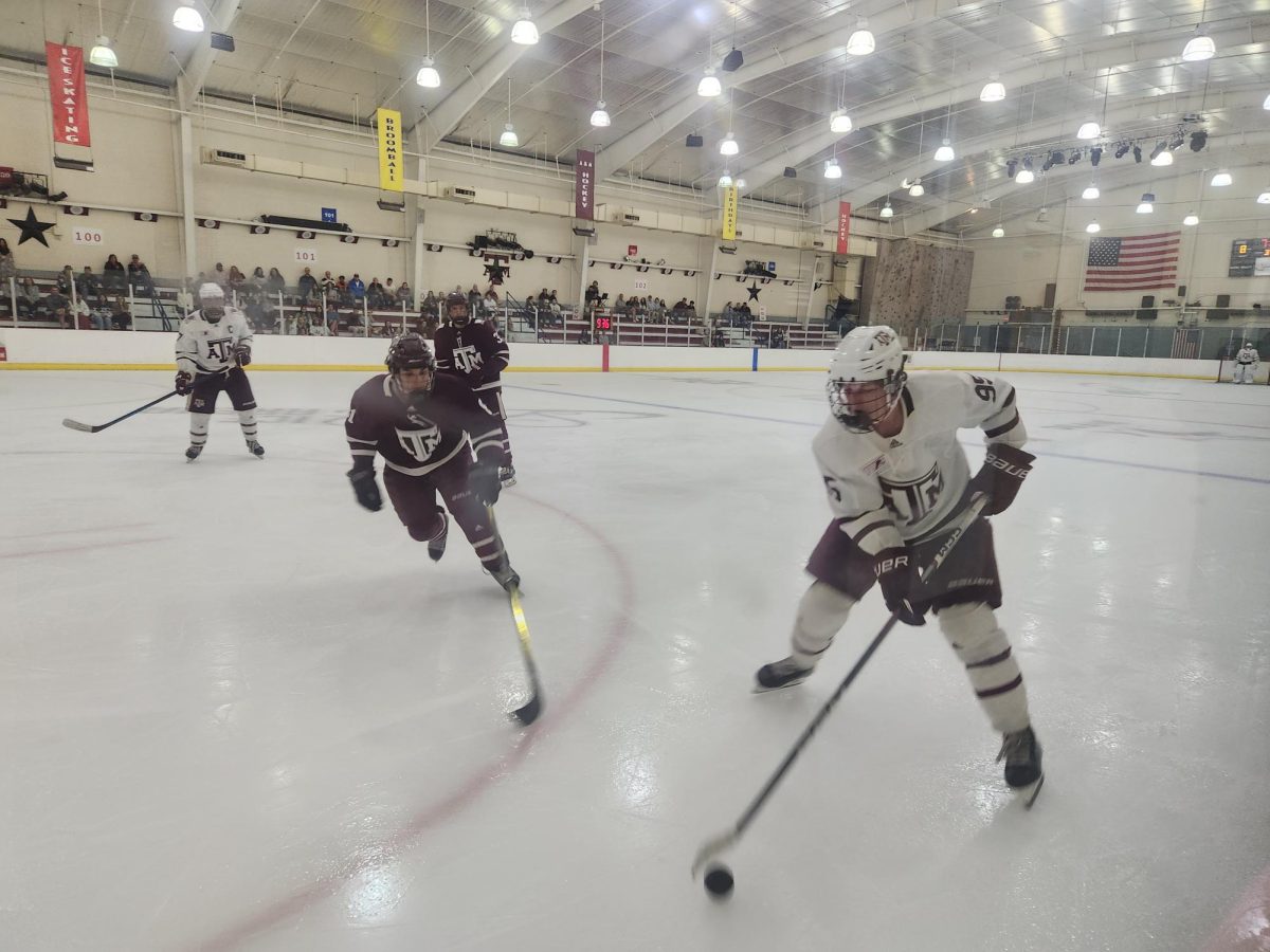 Defenseman freshman Gage Boswell (95) presses the attack for White in the offensive zone during the A&M ice hockey Maroon and White Scrimmage on Aug. 30 at Spirit Ice Arena. Photo by Wyatt Watson, JOUR 359 contributor.