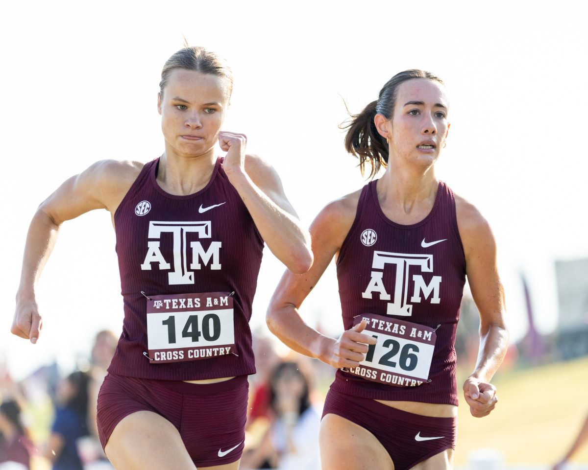 Junior Elise Smoot and senior Nicole Chastain fight to finish the race during Texas A&amp;M's Cross Country Invitational at Dale Watts '71 Cross Country Course on Friday, Sept. 13, 2024. (Adriano Espinosa/The Battalion)