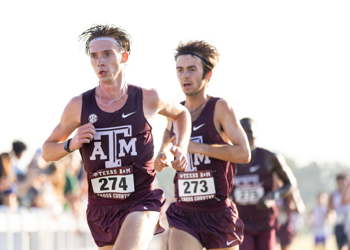 Sophomores Zach Munger and Jack Johnston run the final stretch during Texas A&amp;M's Cross Country Invitational at Dale Watts '71 Cross Country Course on Friday, Sept. 13, 2024. (Adriano Espinosa/The Battalion)