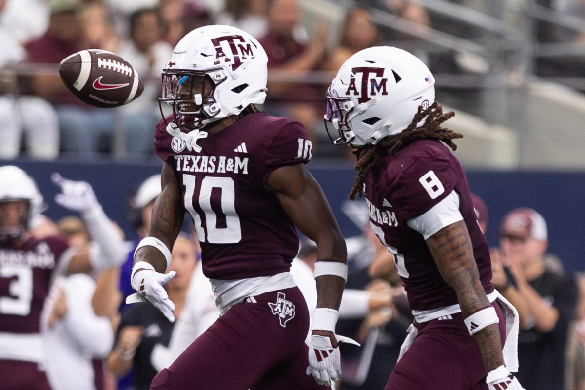 Texas A&M Aggies defensive back Dezz Ricks (10) celebrates his interception during Texas A&M's game against Arkansas at the Southwest Classic at AT&T Stadium in Arlington, Texas on Saturday, Sept. 28, 2024. (Adriano Espinosa/The Battalion)