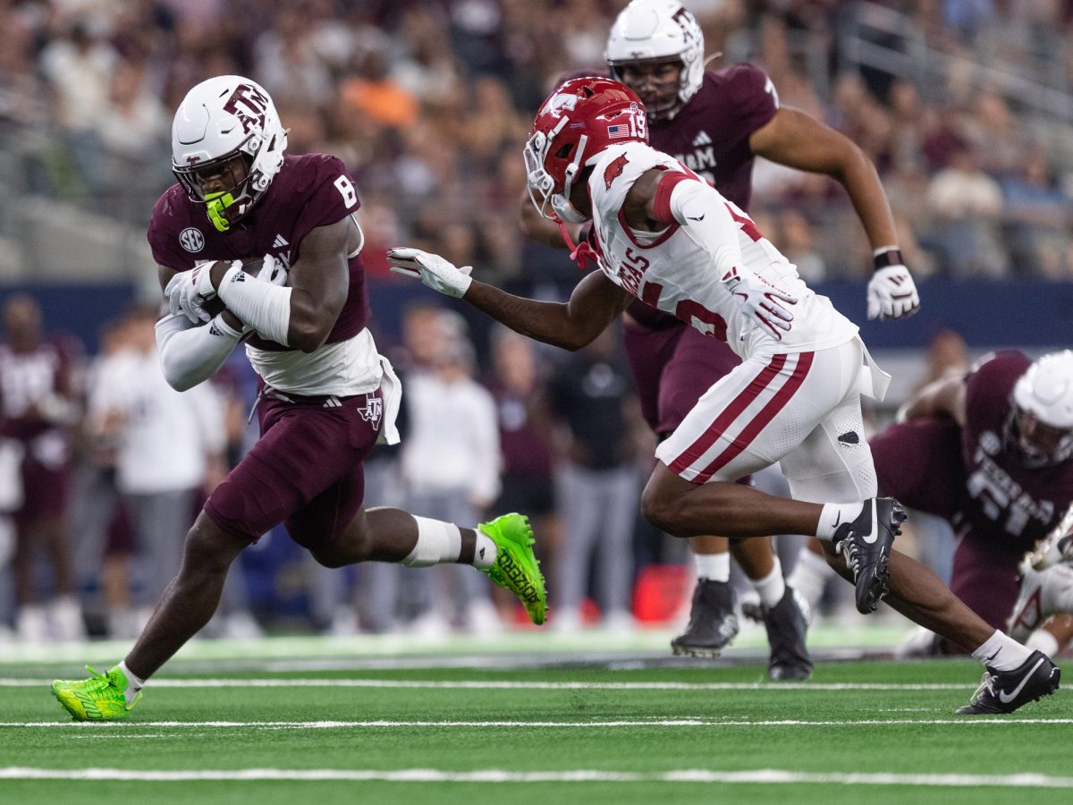 Texas A&amp;M Aggies running back Le'Veon Moss (8) runs the ball during Texas A&amp;M's game against Arkansas at the Southwest Classic at AT&amp;T Stadium in Arlington, Texas on Saturday, Sept. 28, 2024. (Adriano Espinosa/The Battalion)