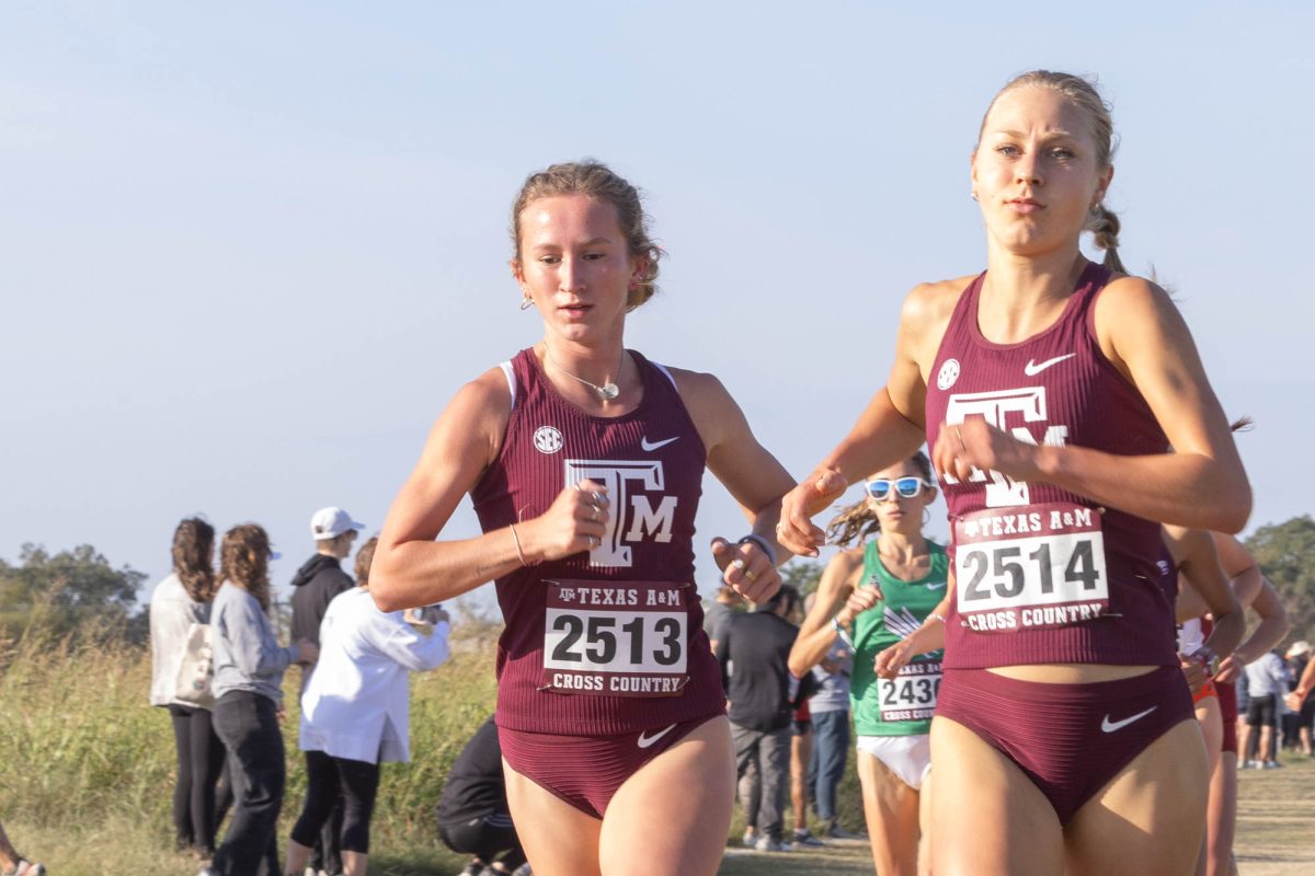 Junior Emma Little and senior Maddie Livingston run during Texas A&amp;M's Arturo Barrios Invitational at Dale Watts '71 Cross Country Courseon Friday, Oct. 18, 2024. (Micah Richter/The Battalion)