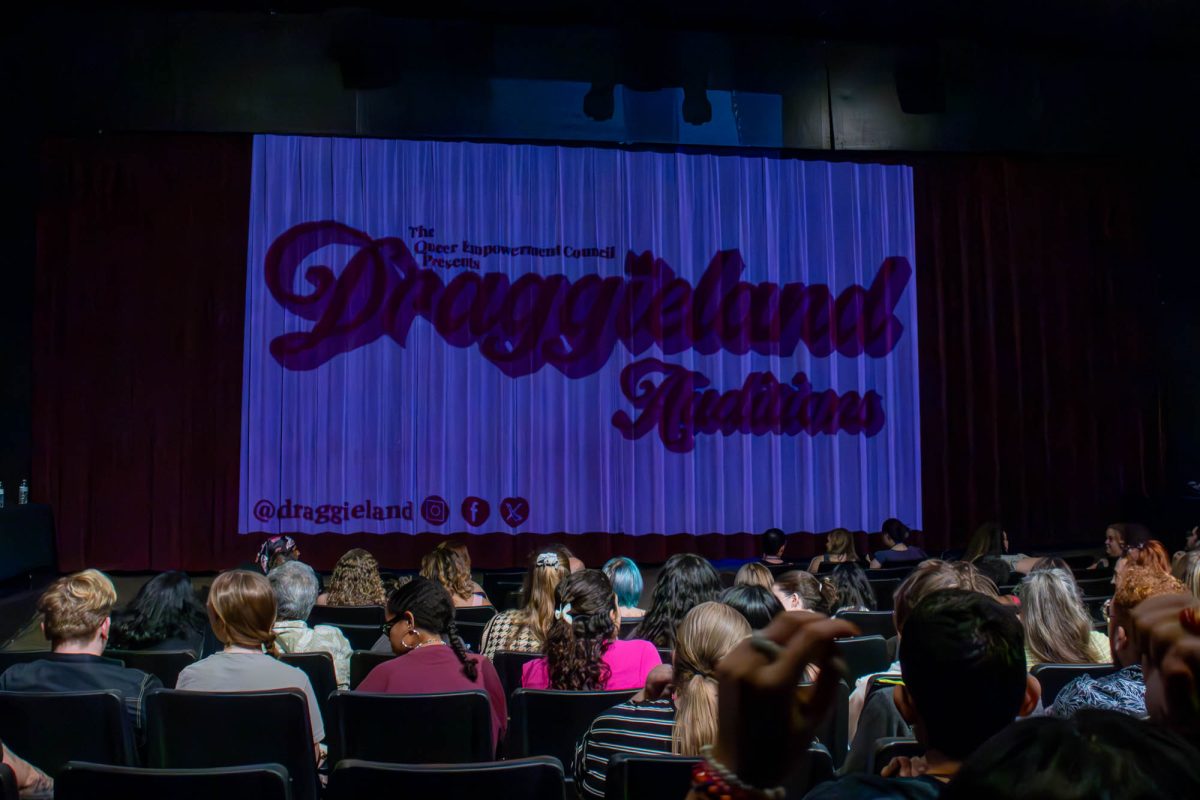 Audience waits for the audience to start at the Draggieland Auditions at The Theater Company of BCS on Friday, Oct. 25, 2024. (Ashely Bautista/The Battalion)